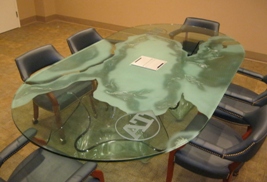 Glass furniture, a growing design trend, faces real-world wear and tear and can benefit from a nanoscale barrier.